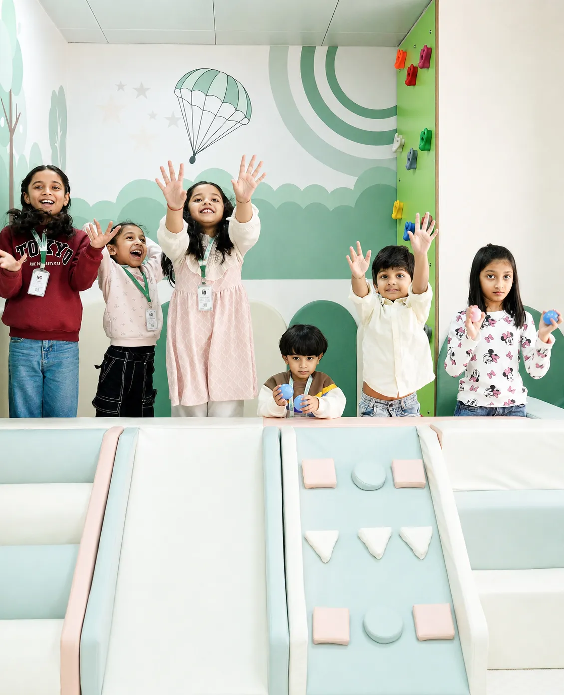 Children enjoying an indoor play activity together at BloomWave